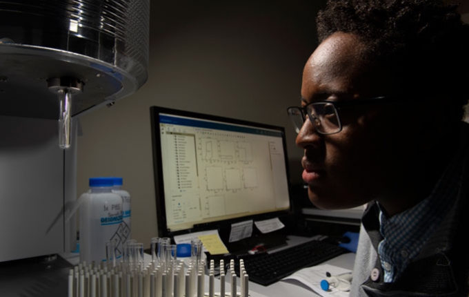 A researcher conducts work in a lab.